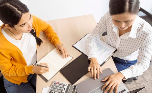 high-angle-asian-women-thinking-about-new-ideas-work-project