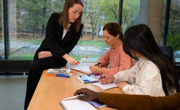 side-view-women-correcting-grammar-mistakes